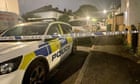 Three children and man found dead in Surrey house