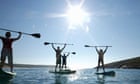 How paddleboarding conquered Britain: the delights and dangers of the nation’s fastest-growing sport