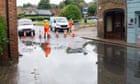 UK weather: commuters face travel disruption after heavy rainfall