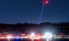 Washington DC plane crash: rescuers search Potomac river for survivors after plane collides with military helicopter – live