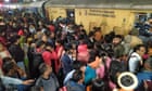 At least 18 people die in crowd crush at Delhi railway station