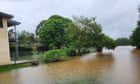 Hell and high water: flooded-in northern rivers residents grapple with ‘no water, no phone or power’